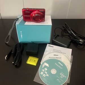 Red Nikon Coolpix S6500 with manual and chargers